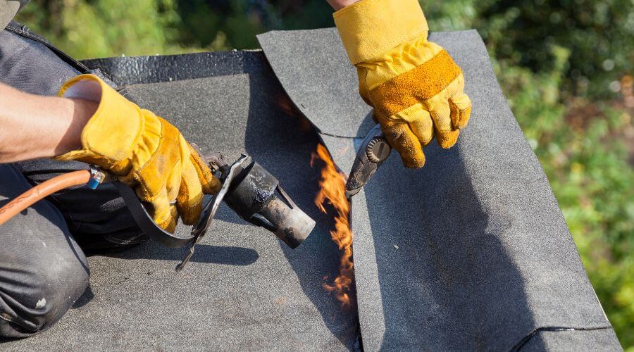 Professional gutter cleaning in Piqua, KS